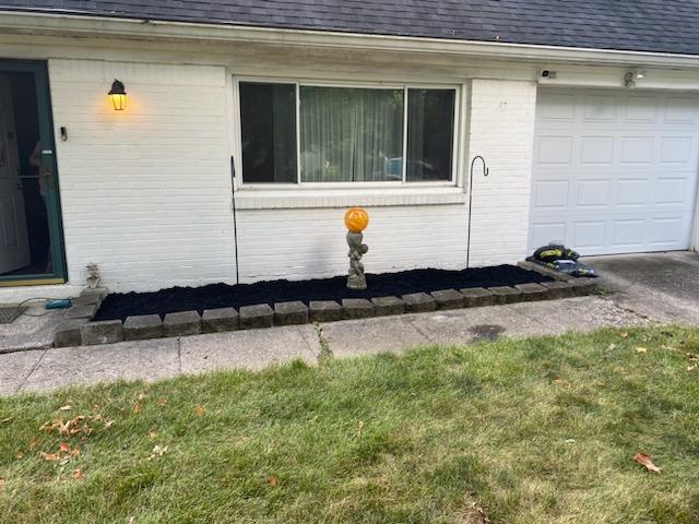 Finished landscaping project completed by Yogi's Landscaping & Handyman Services